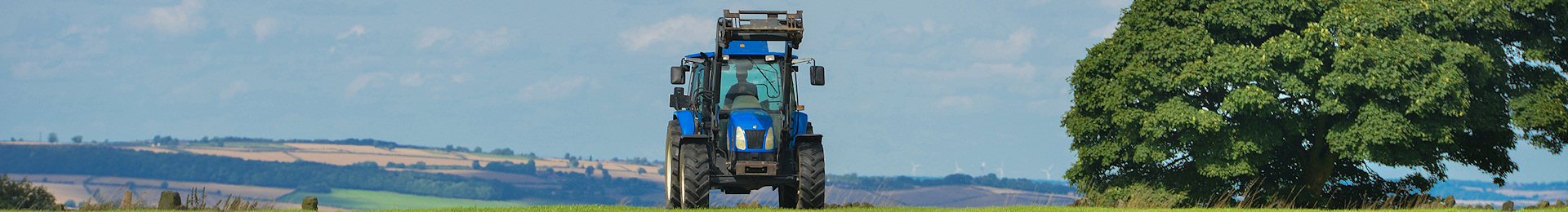 Photograph: Tractor in field.