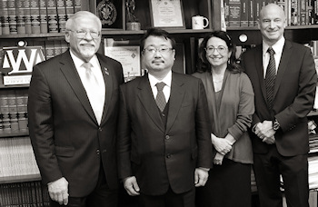 Photograph: Professor Koto Fukui with Thomas Romig, Aida Alaka, and Craig Martin.