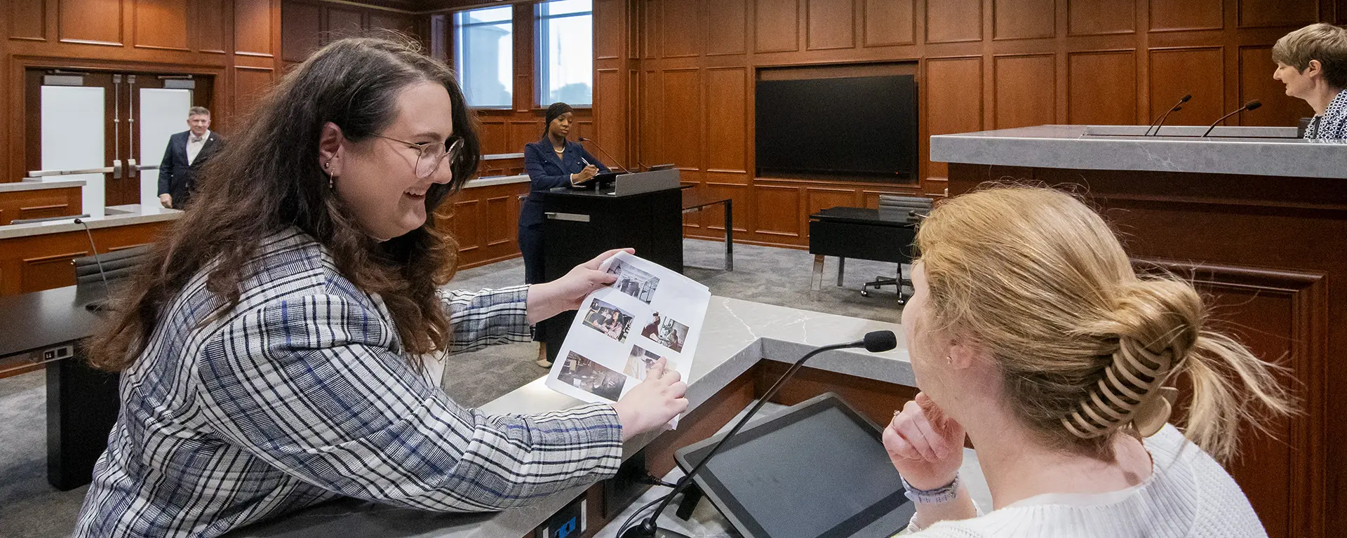 A law student practices in the courtroom. 