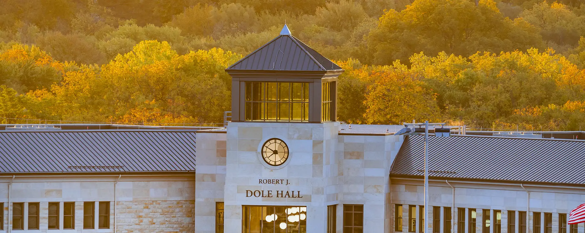 Dole Hall glows with evening light.