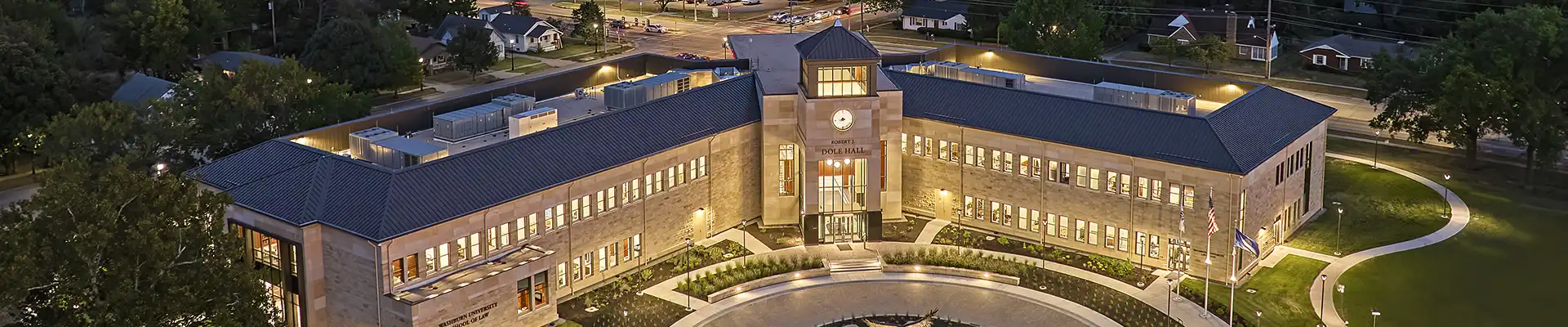 An aerial view of the Dole building at night.