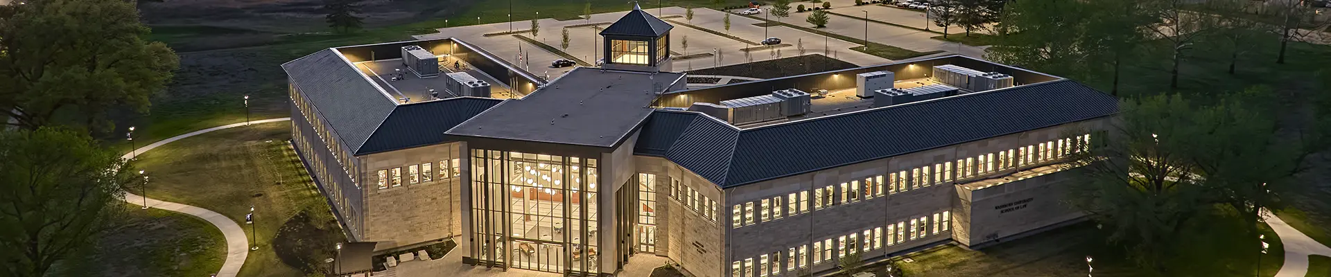 Birds eye view of SOL building south entrance at night.