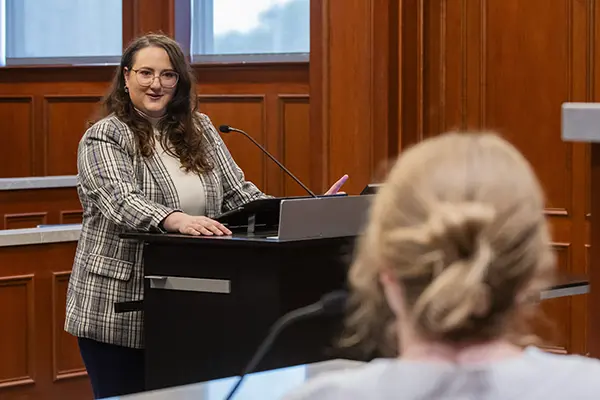 A student practices cross-examining a witness.