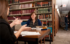Photograph: Students studying in library.