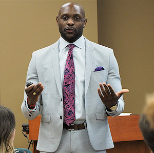 Photograph: Terence Oben speaking at Washburn University School of Law about his career path and corporate compliance.